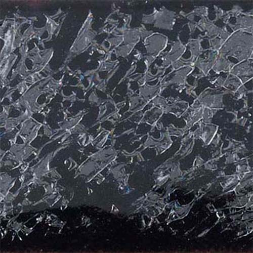 Thompson Lead-Free transparent cracklebase enamel on dark metal surface