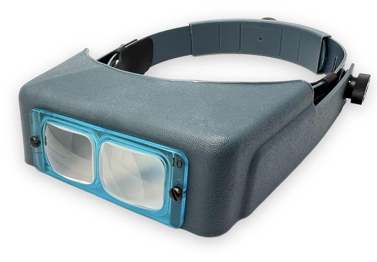 OptiVISOR DA10 3.5X magnification headband visor with adjustable strap and high-quality glass lenses for precise hands-free viewing.