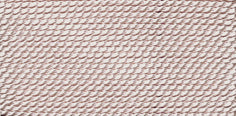 Light pink silk bead cord close-up texture with twisted stainless steel needle attached