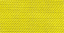 Close-up of bright yellow silk bead cord texture for jewelry making and beadwork projects.