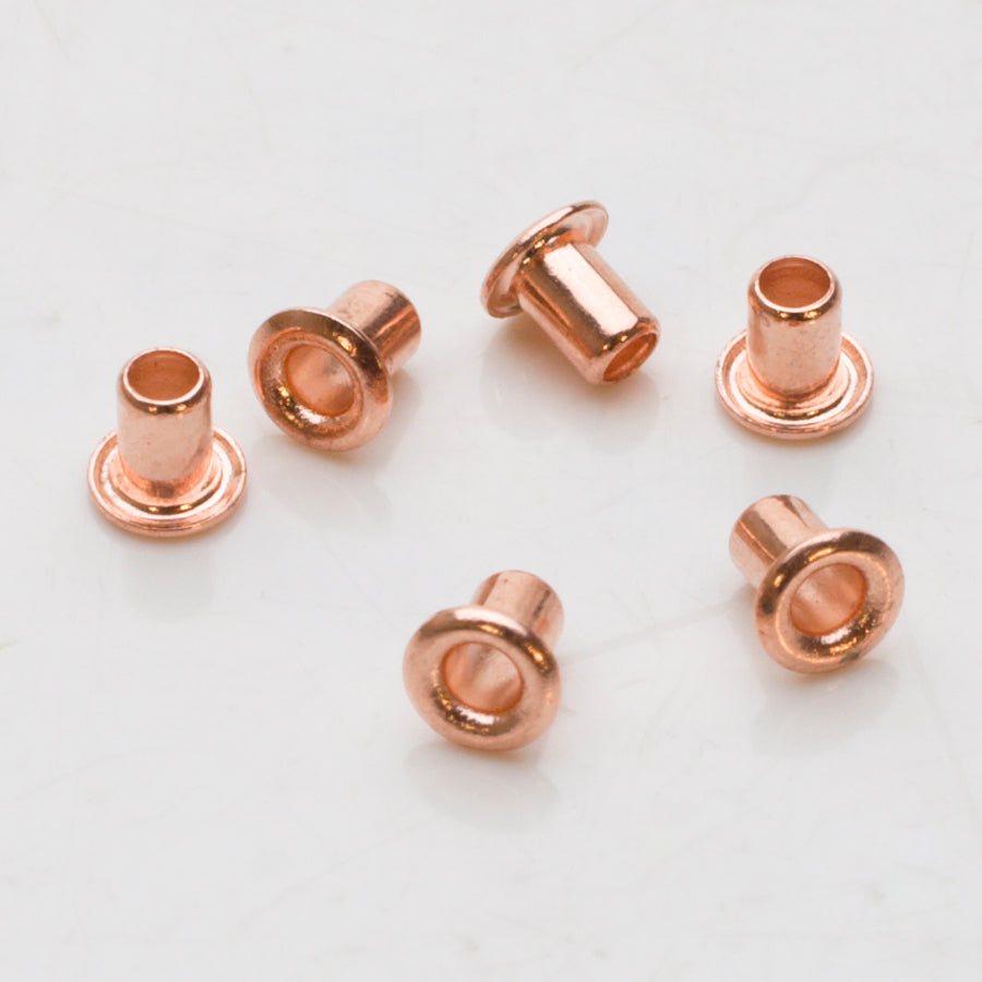 Copper-plated 1/8 inch eyelets with semi-rounded heads for leather and fabric crafting pack of six