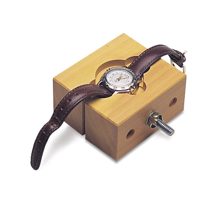 Wooden Watch Case Holder with scratch-free surface and stable base holding a wristwatch