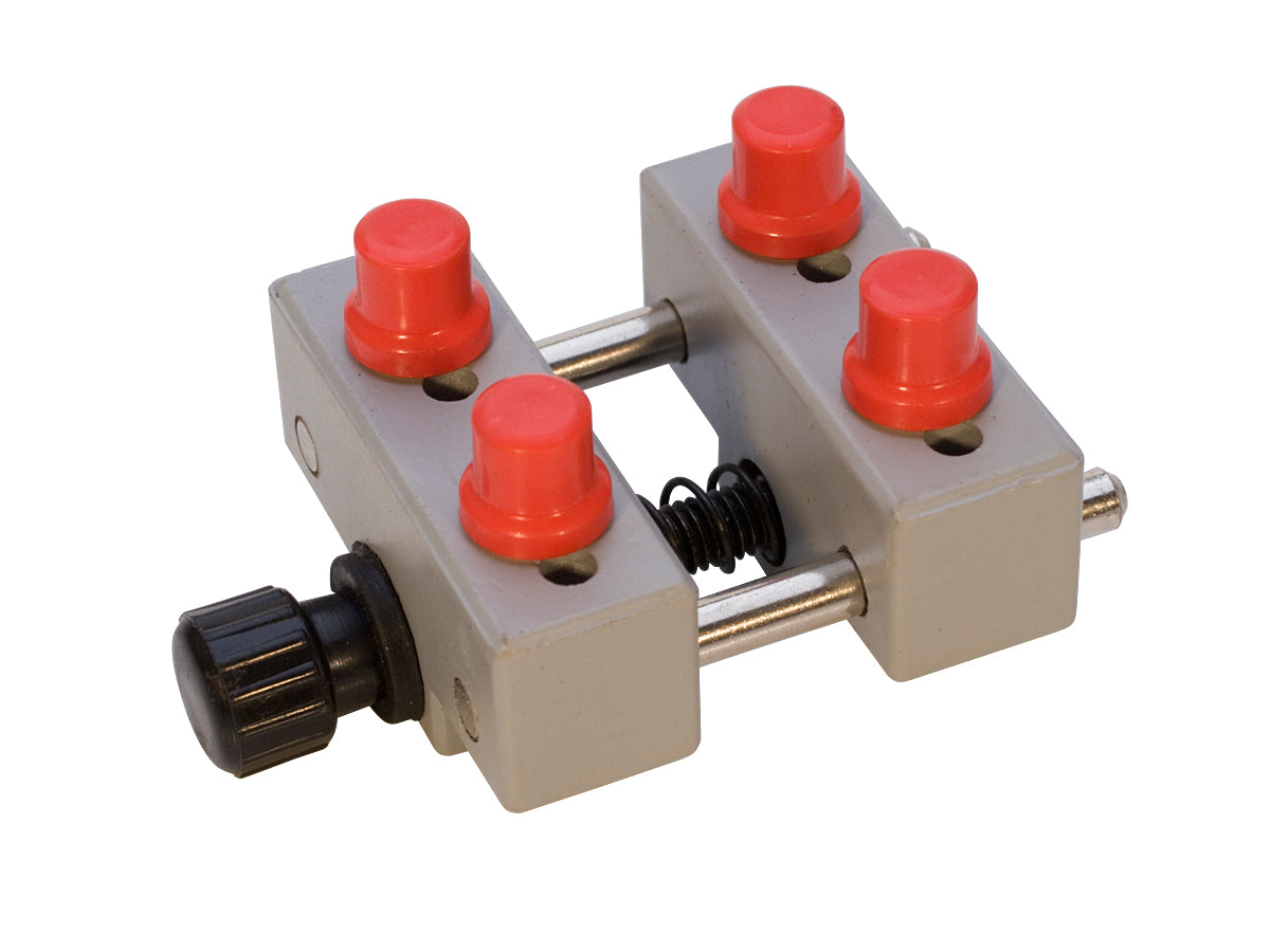 Compact durable case holder with red caps for CWR-656.00 mounting and workspace organization