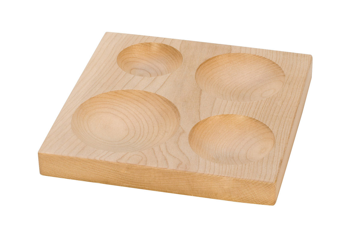 Hardwood shallow groove shaping block with four round depressions for metal shaping