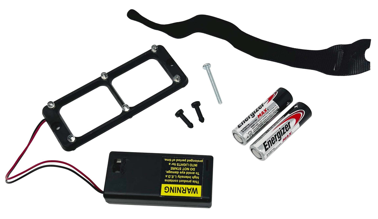 Quasar LED Light Attachment System components with battery pack, screws, and strap for OptiVISOR