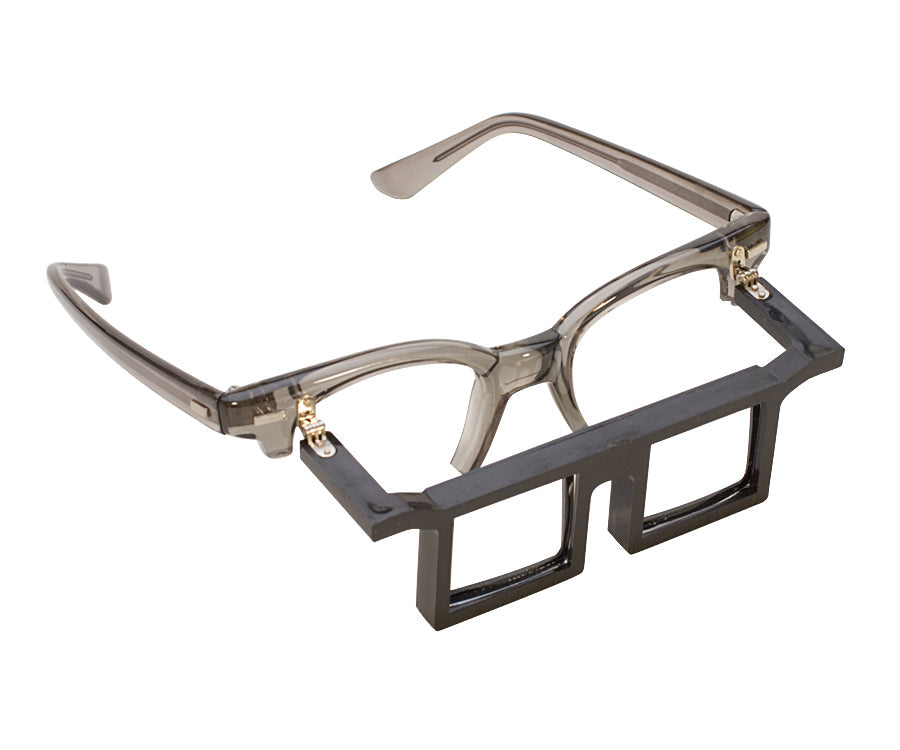 Half-frame telesight magnifier with flip-up prismatic lenses and lightweight glasses-free frame for clear binocular magnification