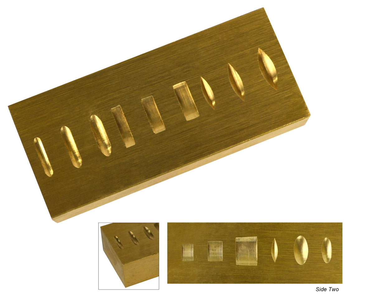 Double-sided brass ring stamping anvil with curved grooves for stabilizing rings during metal stamping and engraving.