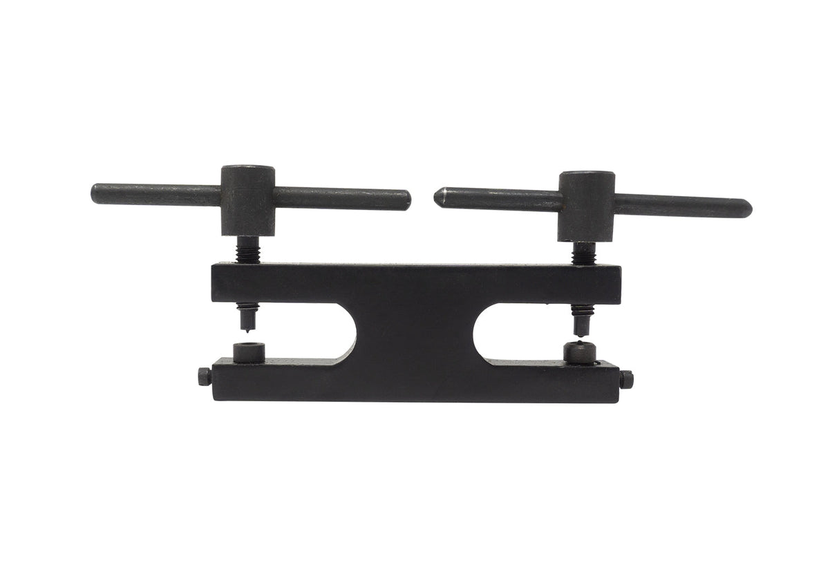 Black hardened steel riveting and eyelet setter tool with two adjustable screws and ergonomic handles for precise metalworking applications