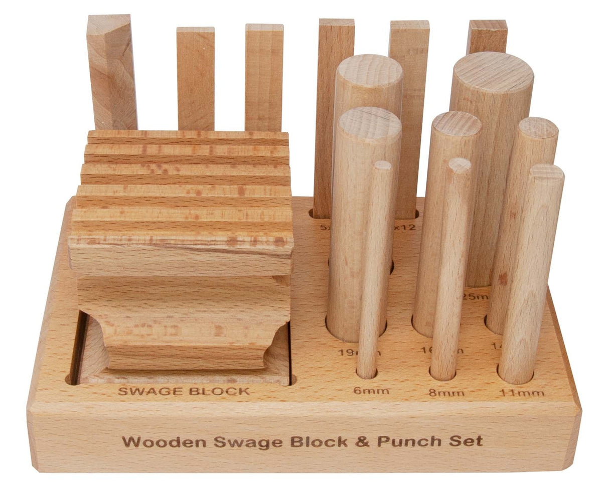Wooden swage block with 15-piece punch set on sturdy wooden base for metal shaping and jewelry making