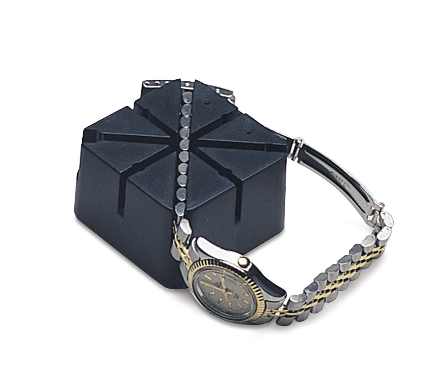 2x2 inch plastic Swiss-made holder with grooves securing wristwatch bracelet for repair tasks