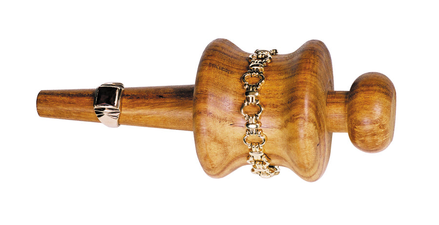 7-3/8 inch hardwood ring and bracelet polishing gizmo with varnished surface holding gold ring and bracelet for jewelry polishing