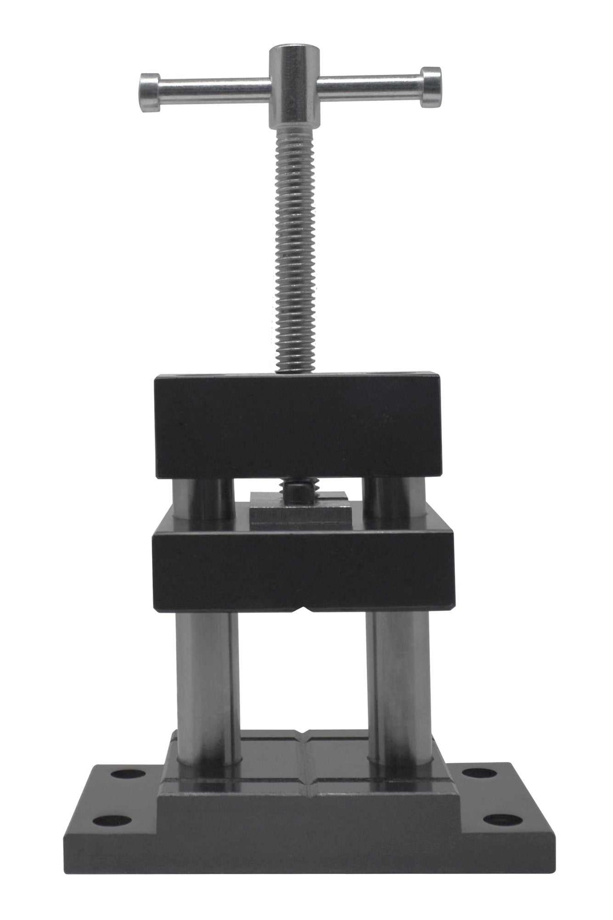 Mountable tabletop bench vise vertically mounted on a workbench holding jewelry tools