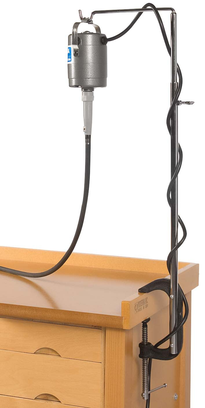 Flex shaft holder with clamp attached to workbench organizing rotary tool overhead