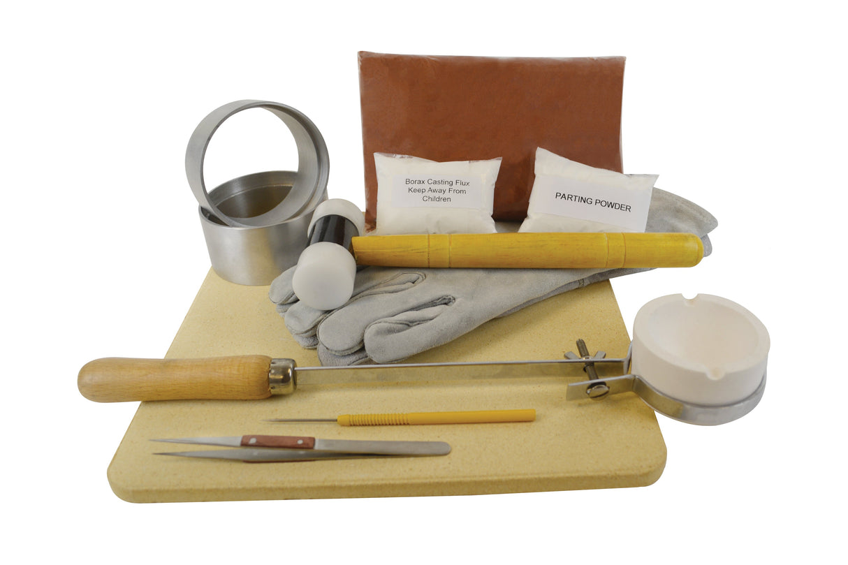 Quick Cast Sand Casting Deluxe Kit with Petrobond mix, gloves, tools, and molds for detailed sand casting projects