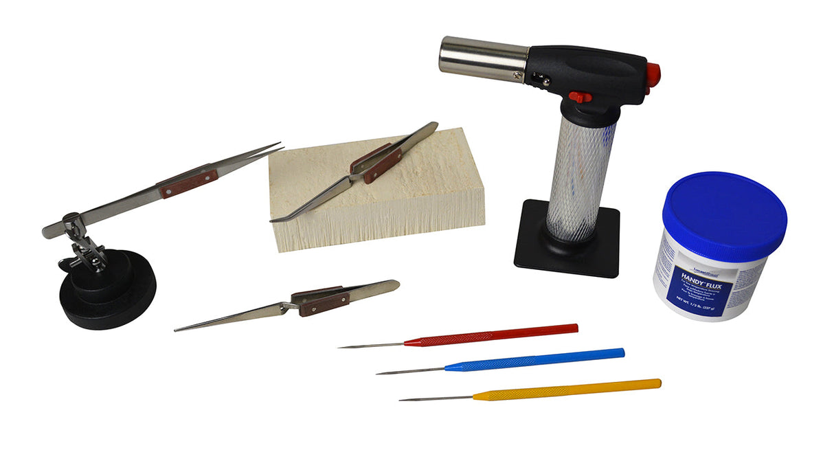 Soldering kit with butane torch, magnesia block, fiber-grip tweezers, flux container, picks, and helping third hand base for precision soldering and jewelry making