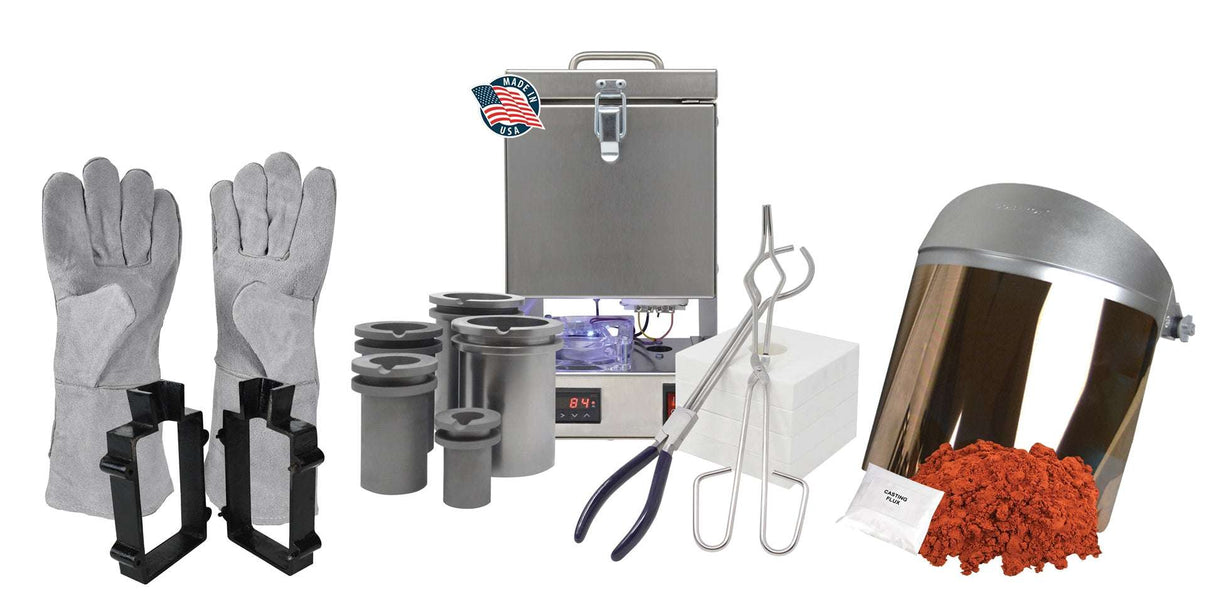 Deluxe QuikMelt TableTop Furnace Sand Casting Set with Petrobond, safety gear, tongs, crucibles, and mold frame on a workbench