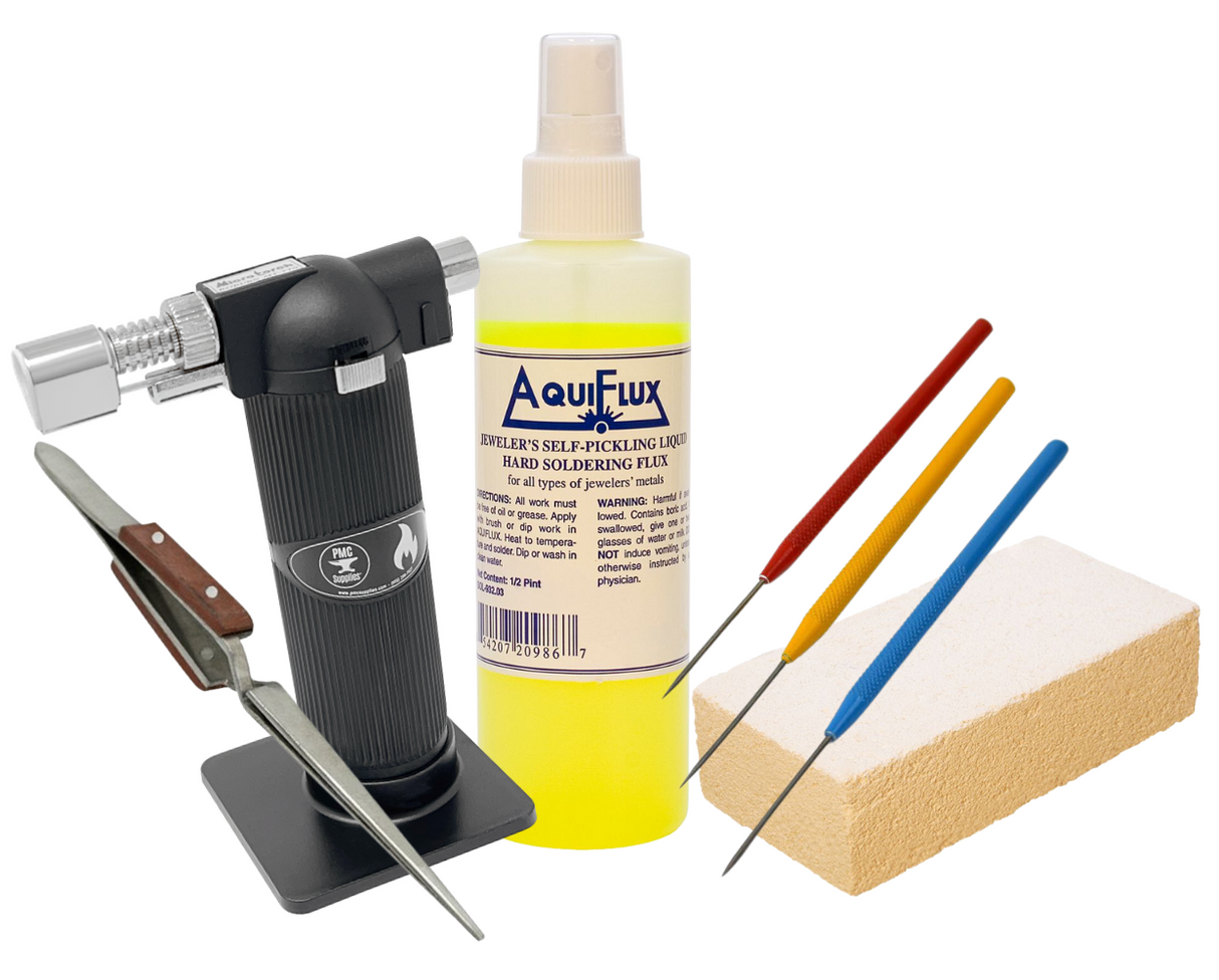 Advanced soldering kit with Aquiflux flux, GREENTHERM 23 brick, tweezers, titanium picks, and micro melting torch for precise electronics work