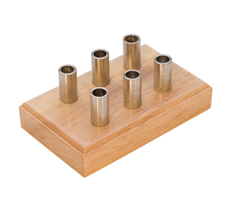 Wooden stand with six metal holders for organizing Multimandrel tools on a workbench