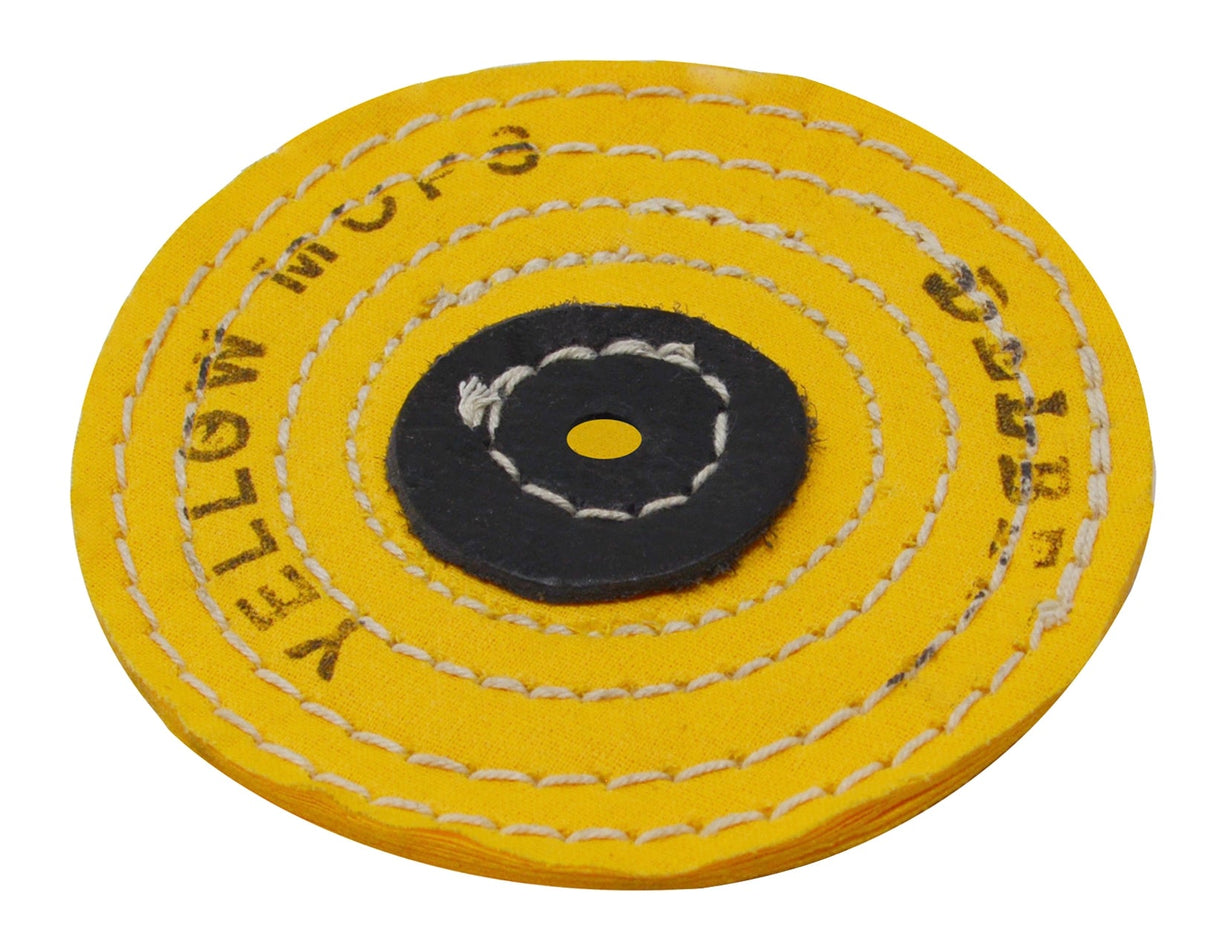 Knife-edge stitched yellow muslin buff with 12 folds and 4-inch diameter for scratch removal and polishing