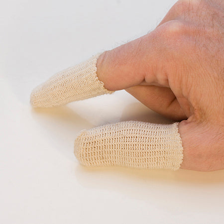 Cotton finger guards on fingers providing breathable, reusable protection for delicate tasks