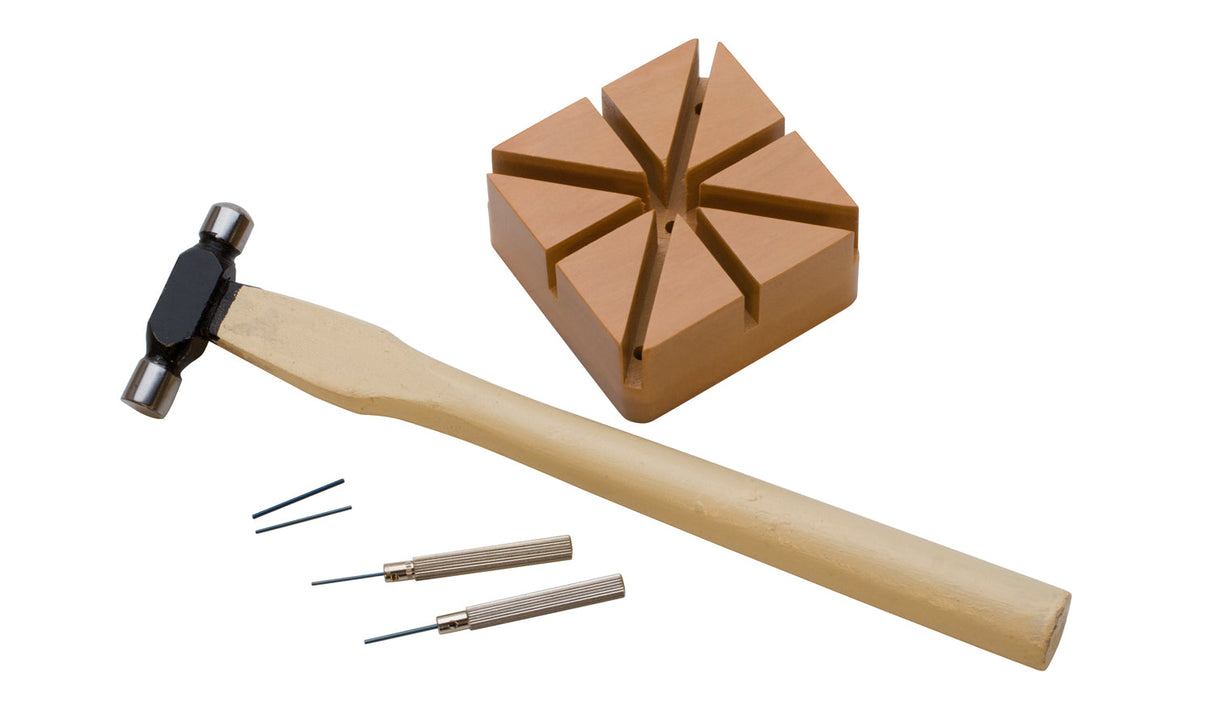 Watch pin removing kit with grooved block, hammer, punch, and steel pins for bracelet adjustments