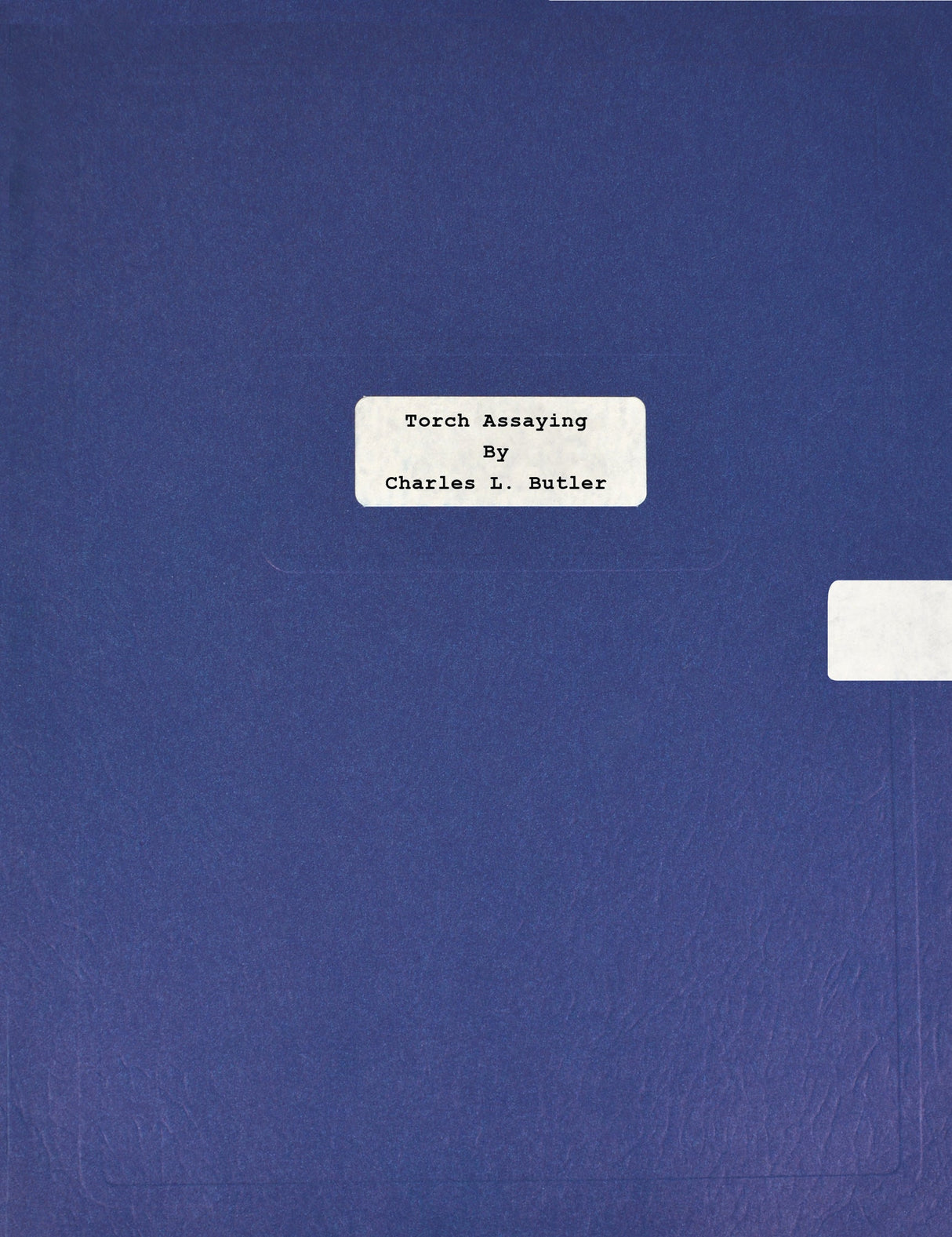 Torch Assaying book by Charles Butler blue cover educational guide on metallurgical analysis