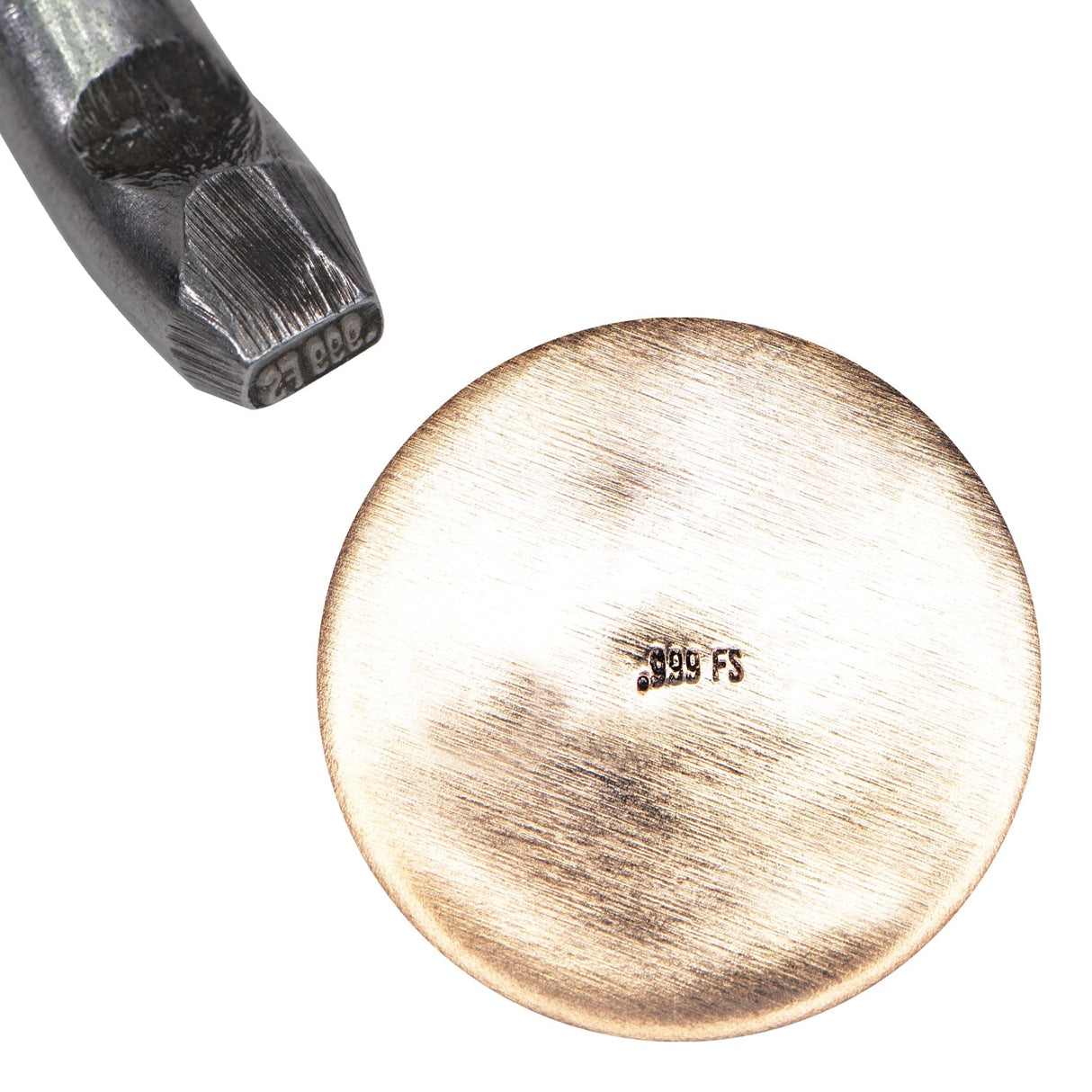 .999FS 3/4 mm bent karat purity stamp tool on metal surface showing clear karat mark
