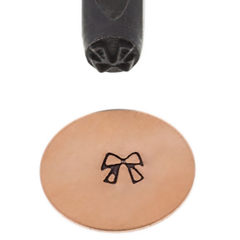 5 mm bow and ribbon design stamp creating clear impressions on metal surface