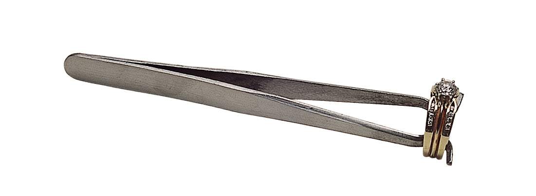 4-1/2 inch ring-setting soldering tweezers holding a gold ring with diamond, precision tool for jewelers