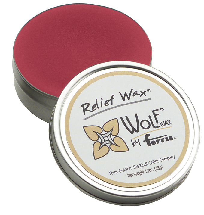 Wolf Relief Wax 2 oz block with smooth red molten wax for detailed carving and raised textures on wax models