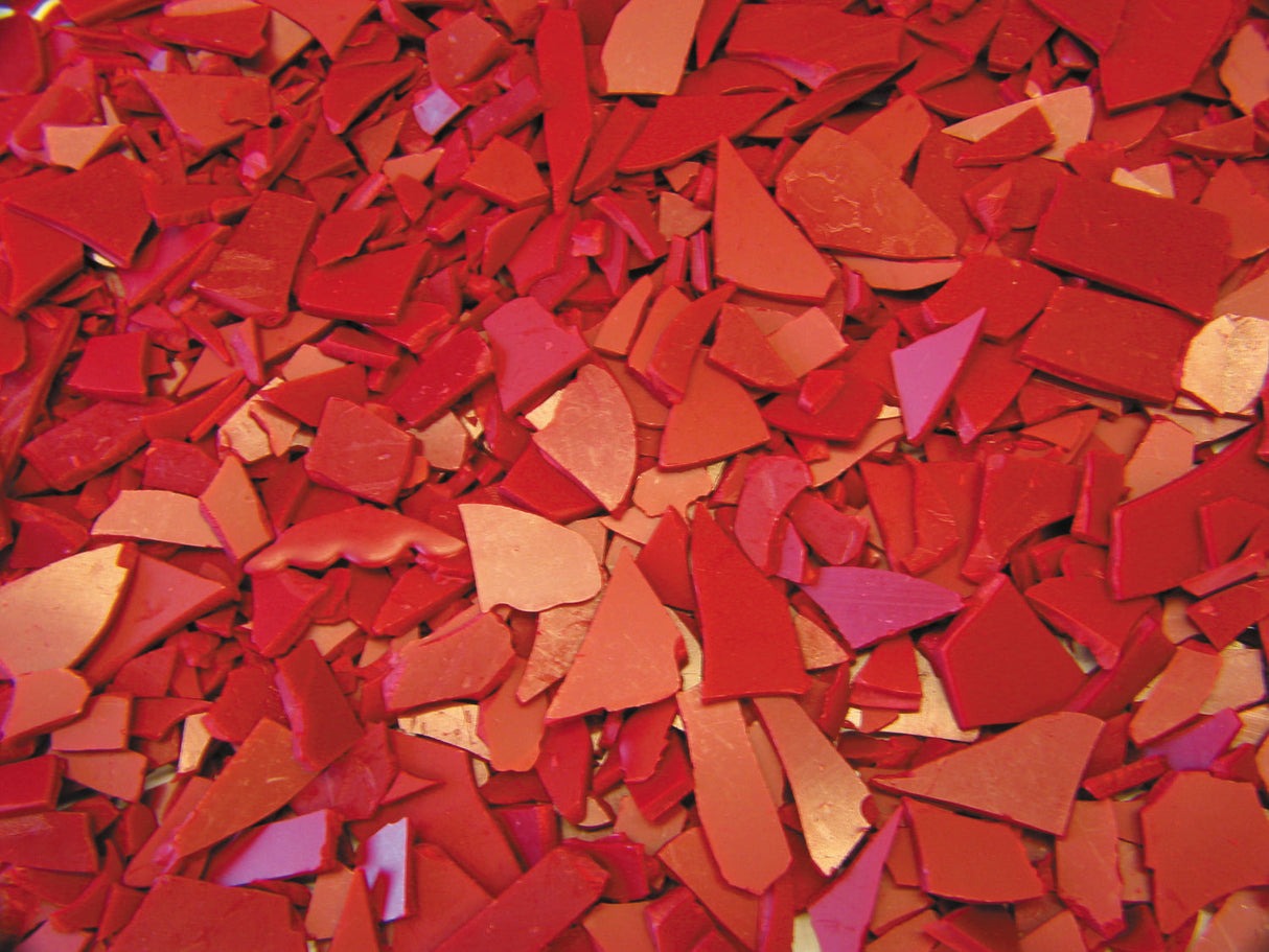 Close-up of Freeman Flakes Ruby Red injection wax flakes for precision casting