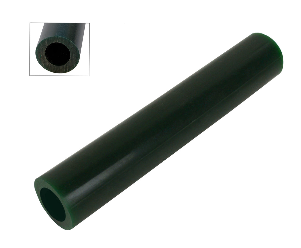 Dark green hard wax ring tube with large off-center hole for jewelry carving and prototyping