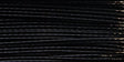 Close-up of black 0.014 inch gauge Soft Flex Wire on a 100 ft spool for flexible jewelry making and beading projects