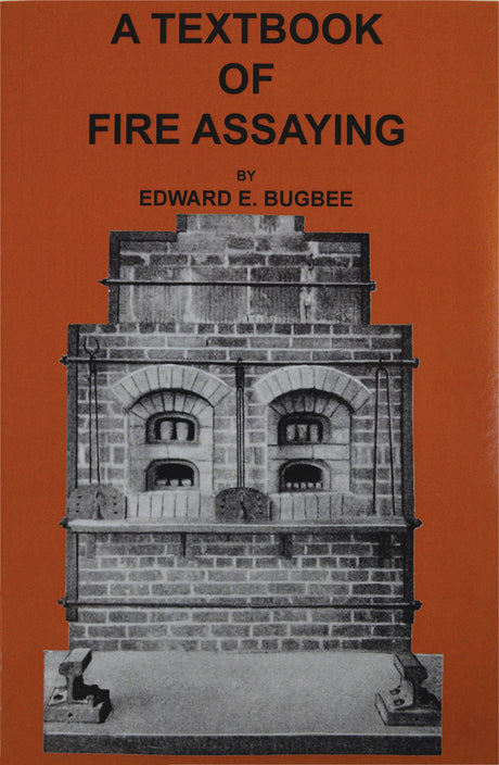 Cover of A Textbook on Fire Assaying by Edward Bugbee with furnace illustration on orange background