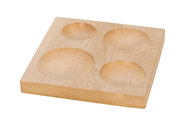 Hardwood shallow groove shaping block with four round depressions for metal shaping