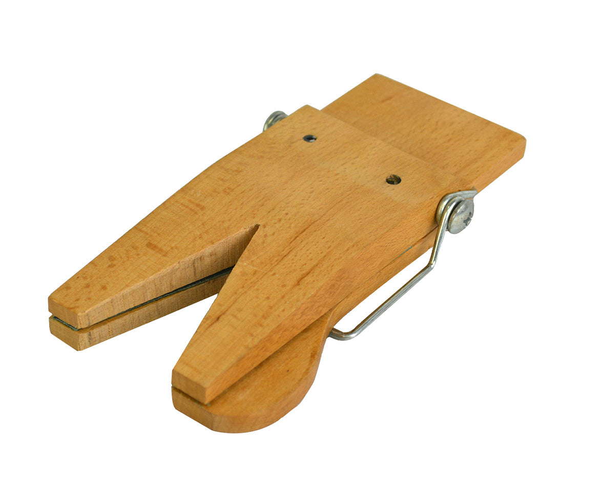 Wooden spring-loaded bench pin saw vise for precise sawing and gentle clamping of metal, wood, or plastic.