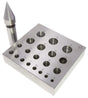 Round bezel block and punch set with 20 tapered holes and hardened steel punch for precise jewelry bezel shaping.