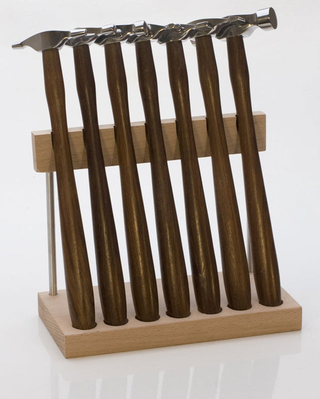 7-Piece Mini Trustrike Hammer Set with polished heads and wooden stand