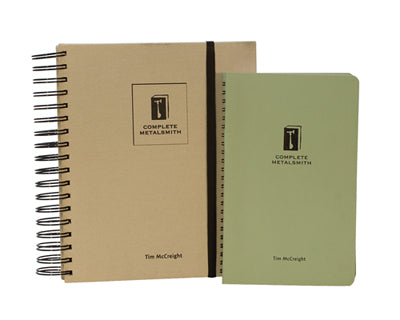 The Complete Metalsmith Professional Edition book by Tim McCreight with brown and green covers on a white background